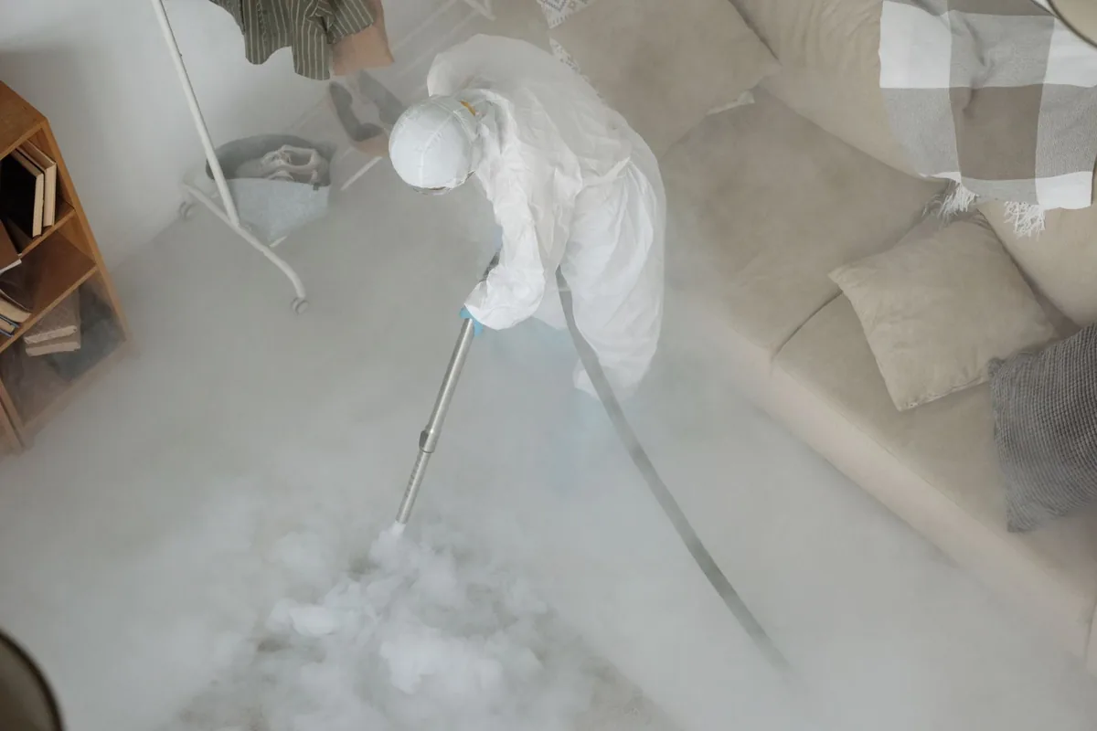 Biohazard cleanup technician in protective equipment, Sun Valley, PA